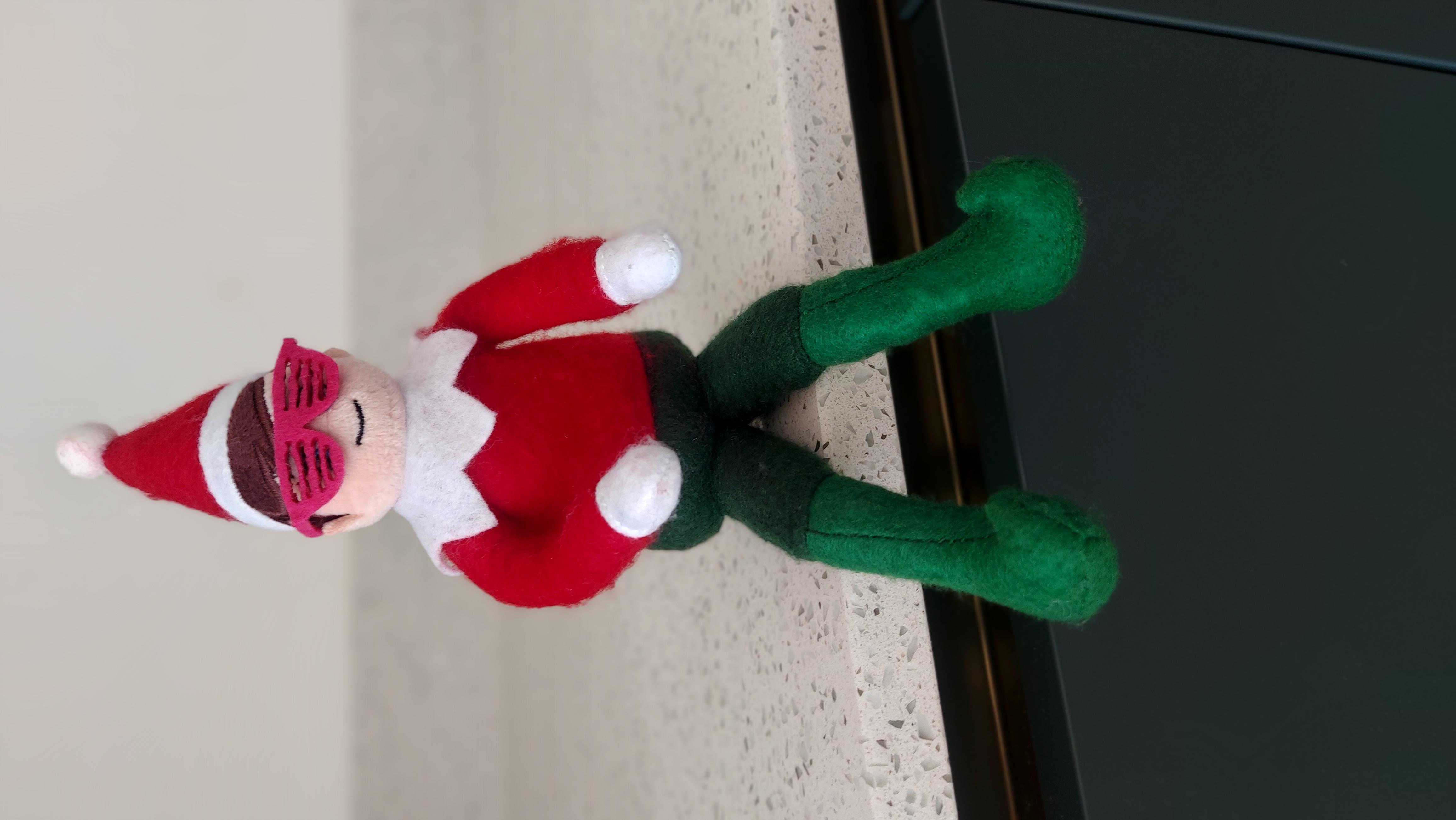 Official Cheeky Elves Jangles Doll - Jangles sitting on edge or worktop